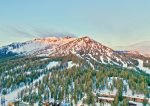 Drone shot showing `Timber Ridge Condominiums` in relation to Mammoth Mountain. The only rental property that has ski-in/ski-out access to both Eagle and Canyon chairlifts.